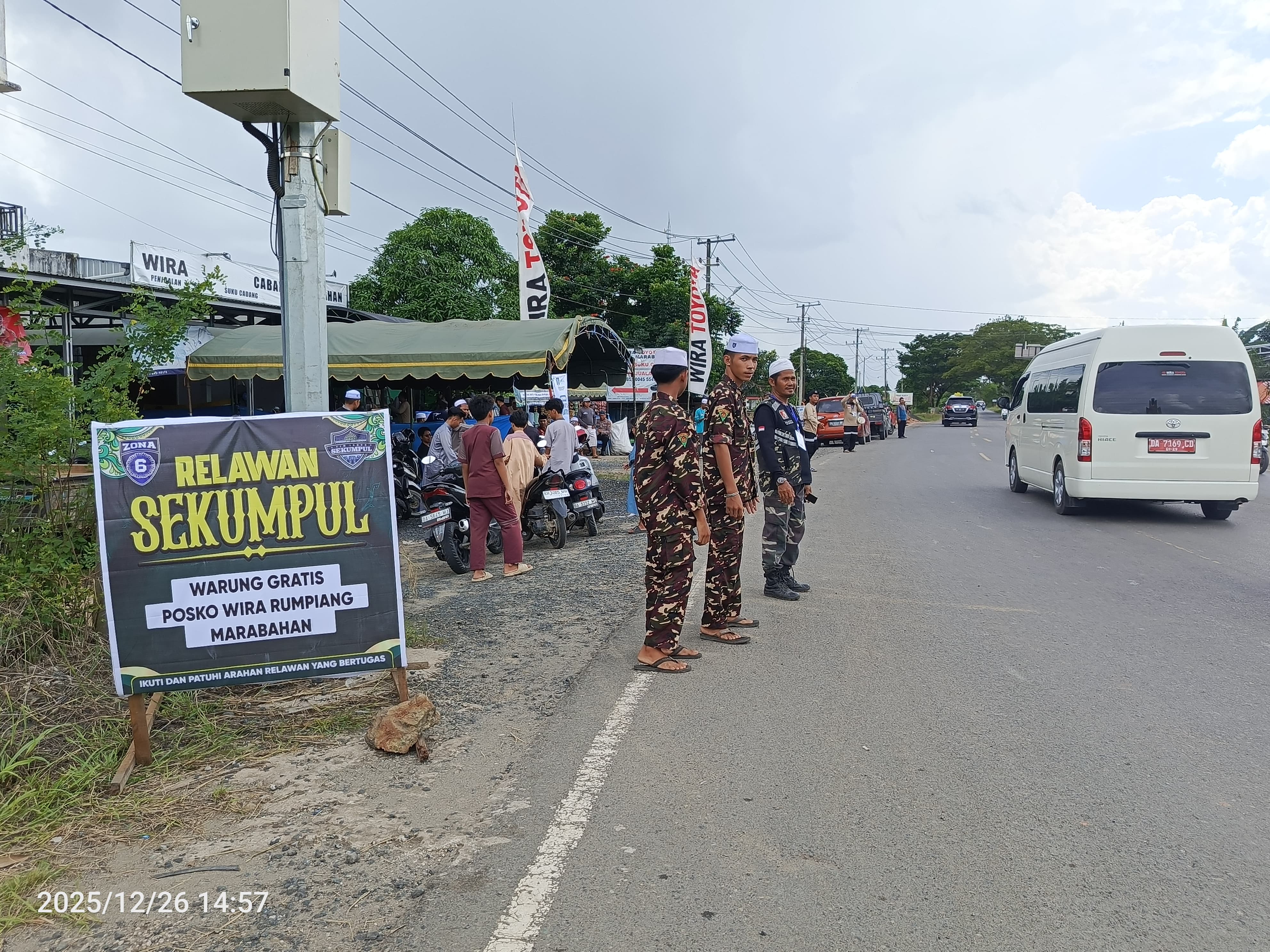 Banser Batola Bertugas di Posko Bundaran Jembatan Rumpiang Layani Jamaah Guru Sekumpul